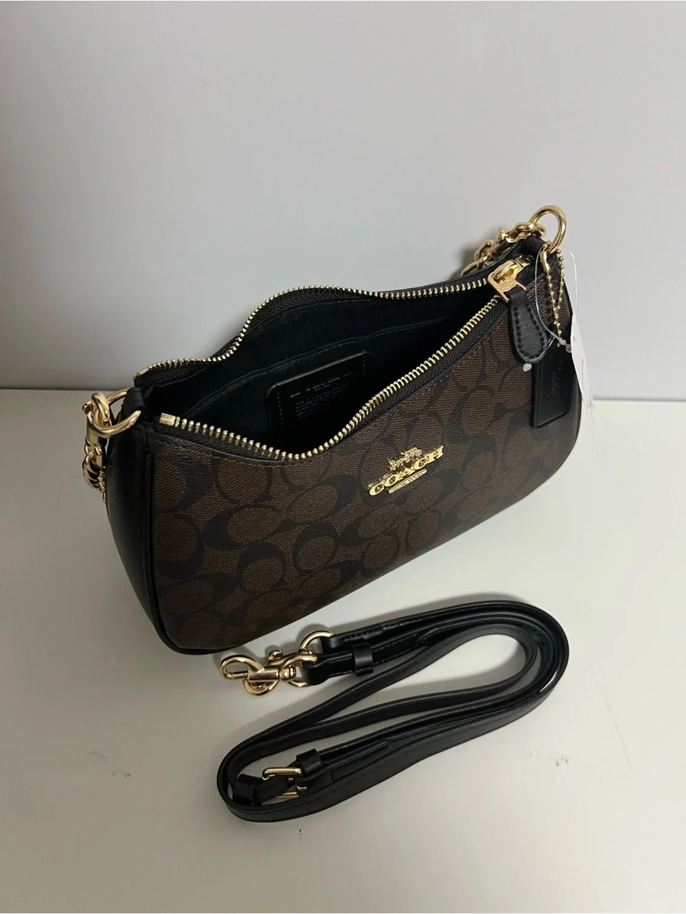 Coach Brown Signature Canvas Shoulder Bag with Black Trim and Gold Hardware